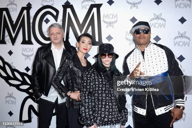 Global Creative Officer Dirk Schonberger, MCM Chief Visionary Officer Kim Sung-joo, Billie Eilish and LL Cool J attend the MCM Rodeo Drive Store...