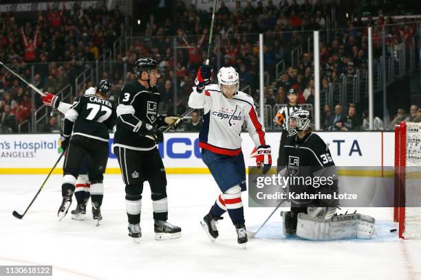 Lars Eller of the Washington Capitals celebrates a goal as Dion Phaneuf of the Los Angeles Kings and Jack Campbell of the Los Angeles Kings look on...