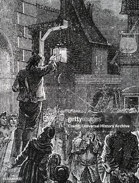 An engraving depicting Parisians watching the candle being lit in the first of La Reynie's street lamps fitted with reflectors in 1758. Dated 19th...