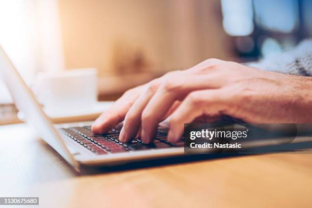 hands of business person working on computer - and booking com application stock pictures, royalty-free photos & images