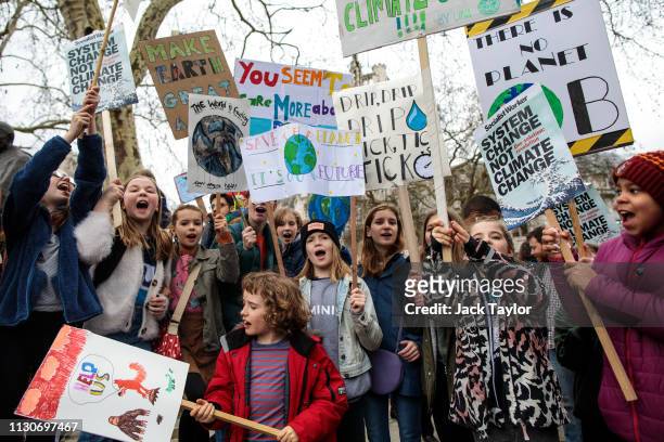 Students take part in a student climate protest on March 15, 2019 in London, England. Thousands of pupils from schools, colleges and universities...