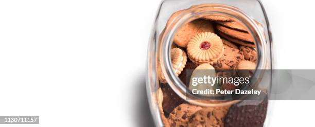 cookie jar filled with a variety of cookies - cookies jar stock pictures, royalty-free photos & images