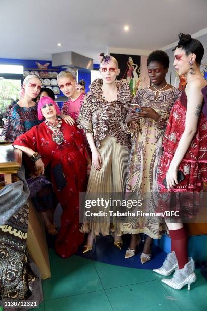 Models pose with Zandra Rhodes backstage ahead of the Zandra Rhodes Presentation during London Fashion Week February 2019 on February 19, 2019 in...