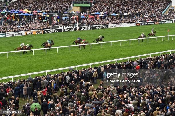 Horse Pentland Hills is riden to victory by jockey Nico de Boinville to win the JCB Triumph Hurdle race on the final day of the Cheltenham Festival...