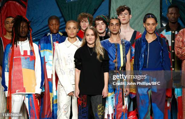 Designer Bethany Williams poses on the runway during the finale of the Bethany Williams show during London Fashion Week February 2019 at the BFC Show...