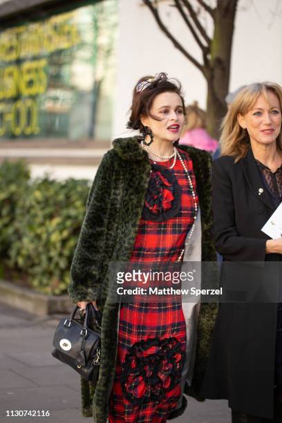 Helena Bonham Carter is seen on the street during London Fashion Week February 2019 wearing Shrimps on February 19, 2019 in London, England.