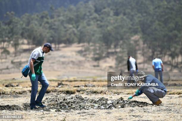 Families of victims from Israel search the crash site of the Ethiopian Airlines operated Boeing 737 MAX aircraft in which their relatives perished...