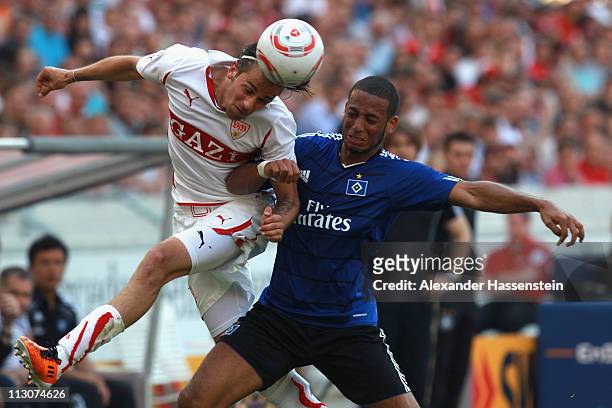 Martin Harnik of Stuttgart battles for the ball with Dennis Aogo of Hamburg during the Bundesliga match between VfB Stuttgart and Hamburger SV at...