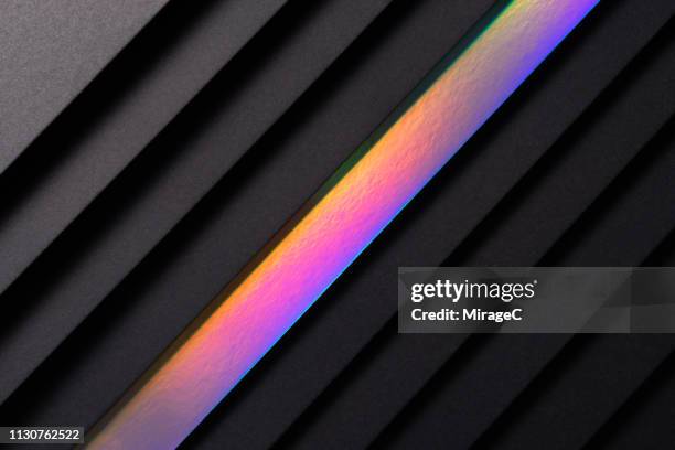 isolated holographic paper in black - holographic foil stock pictures, royalty-free photos & images