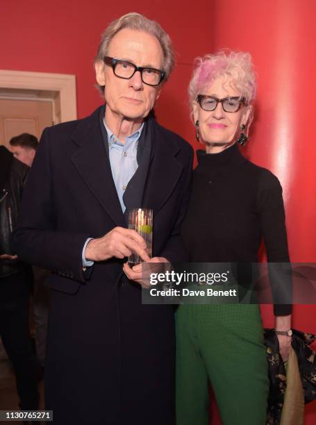 Bill Nighy and Pippa Markham attends a special screening of "The Boy Who Harnessed The Wind" at The Ham Yard Hotel on February 19, 2019 in London,...