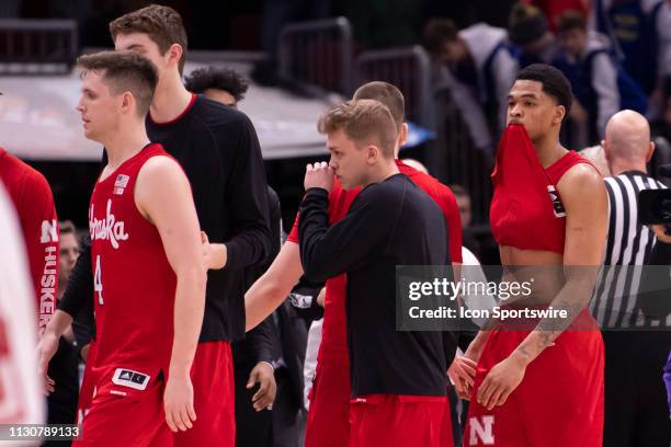 Nebraska Cornhuskers players react after a Big Ten Tournament quarterfinal game between the Nebraska Cornhuskers and the Wisconsin Badgers on March...