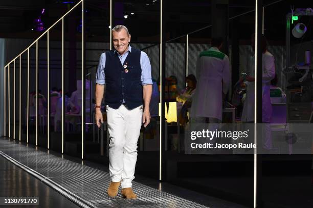 Designer Jean-Charles de Castelbajac acknowledges the applause of the audience after the United Colours Of Benetton show at Milan Fashion Week...