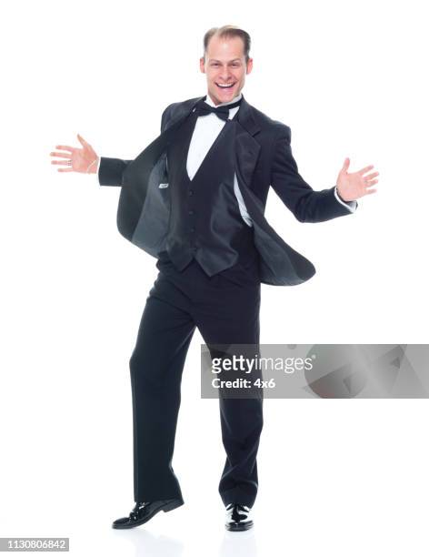 handsome man in tuxedo - dinner jacket stock pictures, royalty-free photos & images