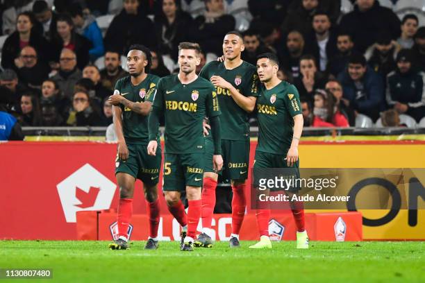 Carlos Vinicius Alves Morais celebrates his goal with Gelson Martins, Adrien Perruchet Da Silva and Rony Lopes during the Ligue 1 match between Lille...