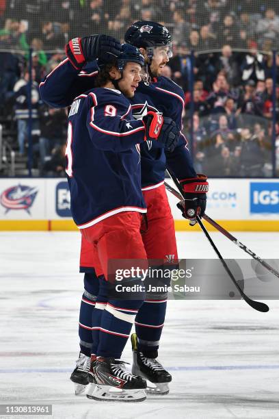 Adam McQuaid of the Columbus Blue Jackets celebrates his first period goal with teammate Artemi Panarin of the Columbus Blue Jackets during a game...