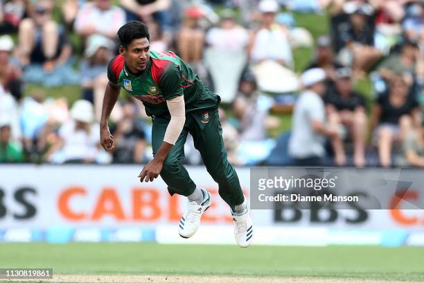 Mustafizur Rahman of Bangladesh bowls during Game 3 of the One Day International series between New Zealand and Bangladesh at University Oval on...