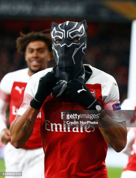 Pierre-Emerick Aubameyang of Arsenal celebrate with a mask during Europa League Round of 16 2nd Leg between Arsenal and Rennes at Emirates stadium ,...
