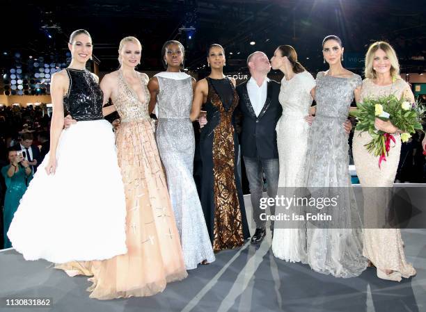 Alana Siegel, model Franziska Knuppe, model Marie Amiere, designer Brian Rennie, Dagmar Koegel, German presenter Frauke Ludowig and models during the...