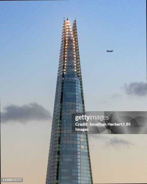 shard flypast - london - flypast stock pictures, royalty-free photos & images