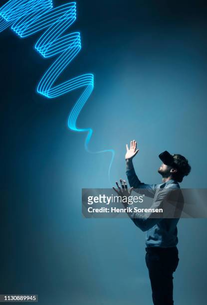 young man looking up at lightrace - school denmark stock pictures, royalty-free photos & images
