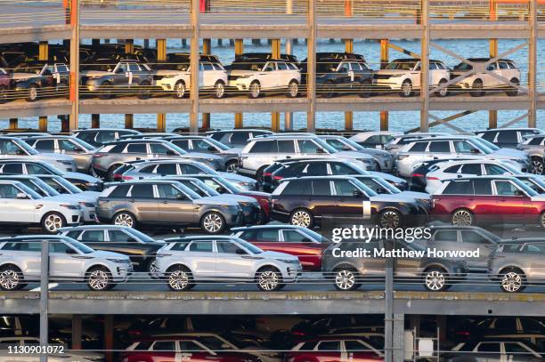 Hundreds of Land Rovers, made by British multinational car manufacturer Jaguar Land Rover, in a multi-storey car park awaiting shipping at the Port...