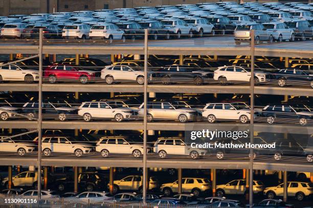 Hundreds of Land Rovers, made by British multinational car manufacturer Jaguar Land Rover, in a multi-storey car park awaiting shipping at the Port...