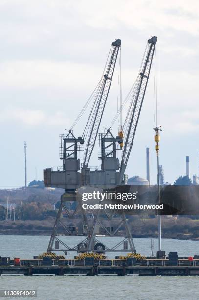 Cranes at the Port of Southampton on February 10, 2019 in Southampton, England. The Port of Southampton is a passenger and cargo port in the central...