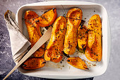 Dish of baked Butternut squashes ready to eat.