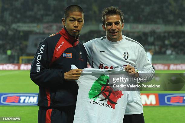 Alessandro Del Piero of Juventus FC and Takayuki Morimoto of Catania Calcio prior to the Serie A match between Juventus FC and Catania Calcio at...