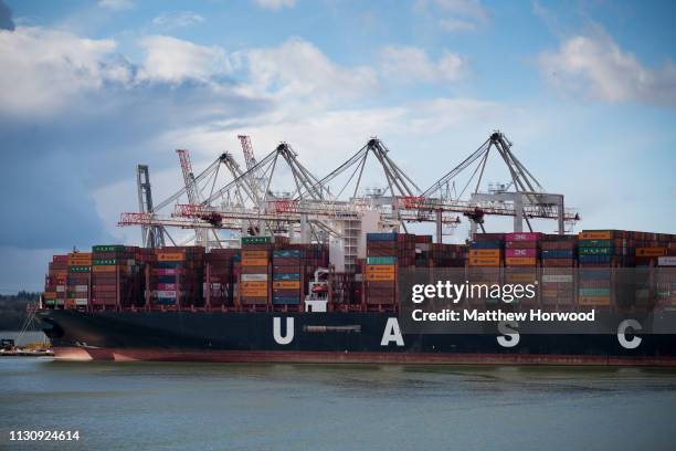 Shipping containers at the Port of Southampton on February 10, 2019 in Southampton, England. The Port of Southampton is a passenger and cargo port in...