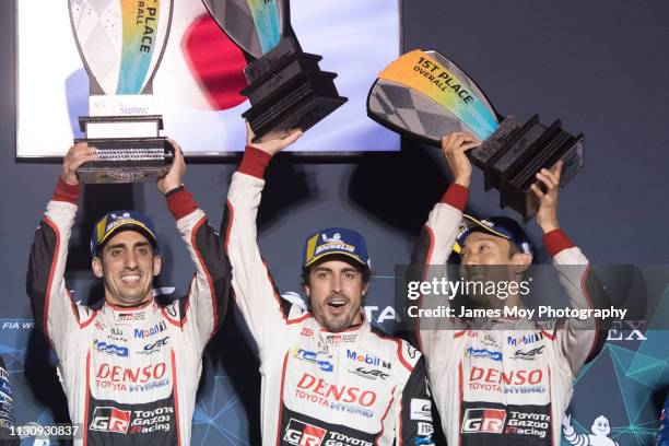 Race winners Sebastien Buemi of Switzerland and Toyota Gazoo Racing, Fernando Alonso of Spain and Toyota Gazoo Racing, and Kazuki Nakajima of Japan...