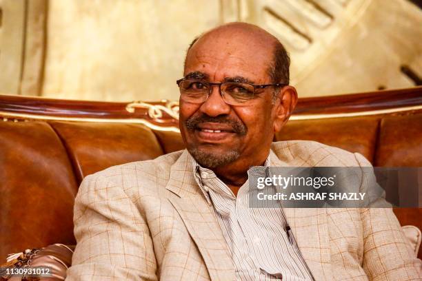 Sudanese President Omar al-Bashir receives the visiting Russian deputy foreign minister in the capital Khartoum on March 16, 2019.