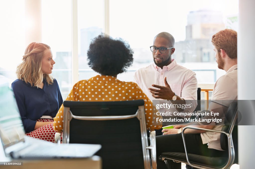 Business people having meeting in modern office