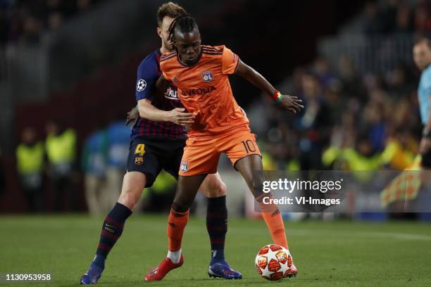 Ivan Rakitic of FC Barcelona, Bertrand Traore of Olympique Lyonnais during the UEFA Champions League round of 16 match between FC Barcelona and...