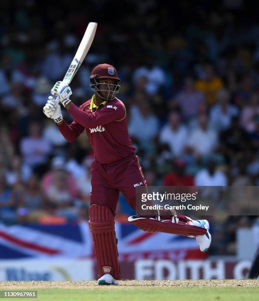 Shimron Hetmyer of the West Indies bats during the 1st One Day International match between the West Indies and England at Kensington Oval on February...