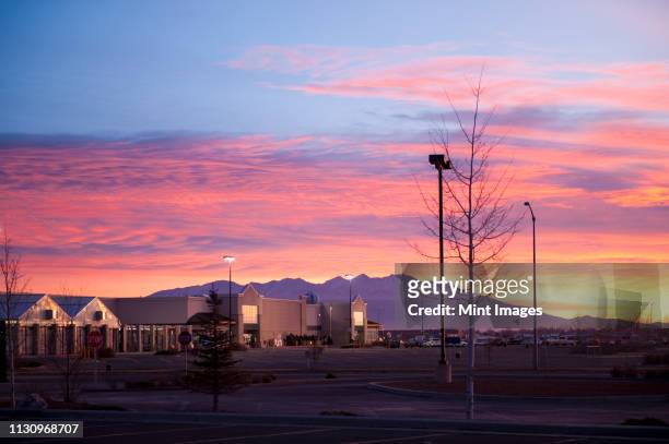 sunrise over shopping center - alamosa county stock pictures, royalty-free photos & images