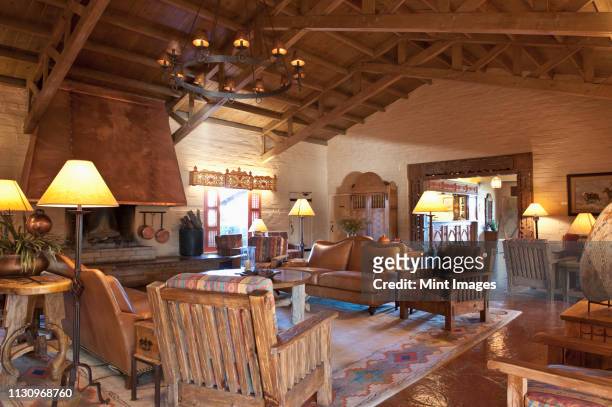 southwestern style great room - rustic cabin stock pictures, royalty-free photos & images