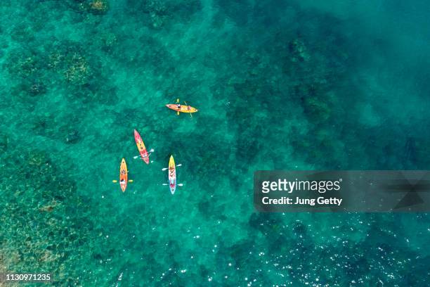 aerial view group of traveler kayaking at the beach of phuket ,thailand - seascape stock pictures, royalty-free photos & images