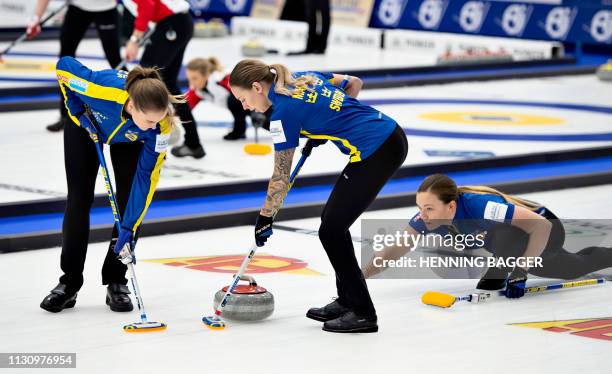 Sweden's players compete in the first round match Sweden vs. China at the LGT World Women's Curling Championship in Silkeborg, Denmark, on March 16,...