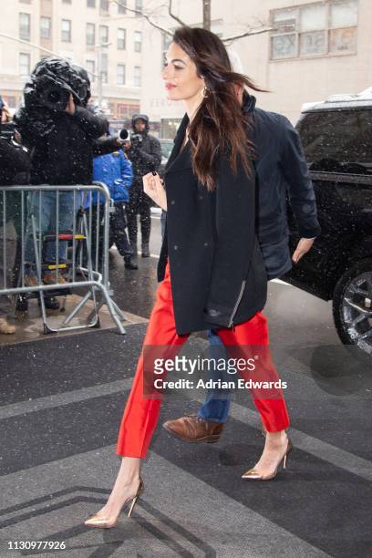 Amal Clooney arrives at Meghan, Duchess of Sussex's baby shower on February 20, 2019 in New York City.