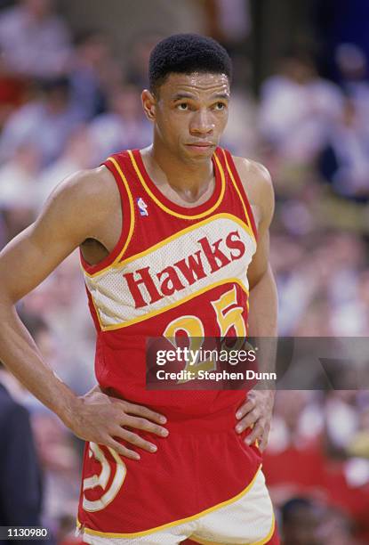 Glenn "Doc" Rivers of the Atlanta Hawks stands on the court during a NBA game against the Los Angeles Lakers at the Great Western Forum in Inglewood,...