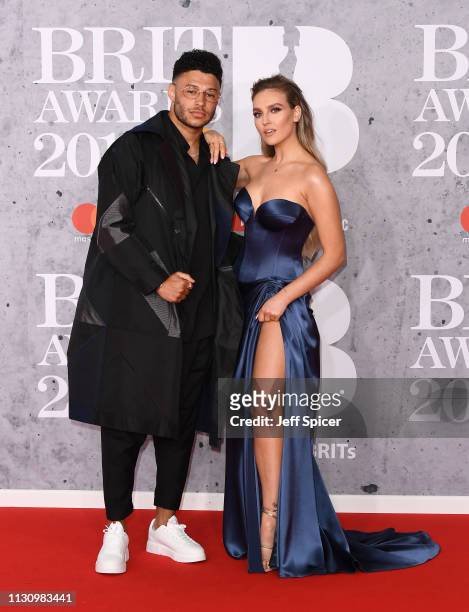 Alex Oxlade-Chamberlain and Perrie Edwards attend The BRIT Awards 2019 held at The O2 Arena on February 20, 2019 in London, England.