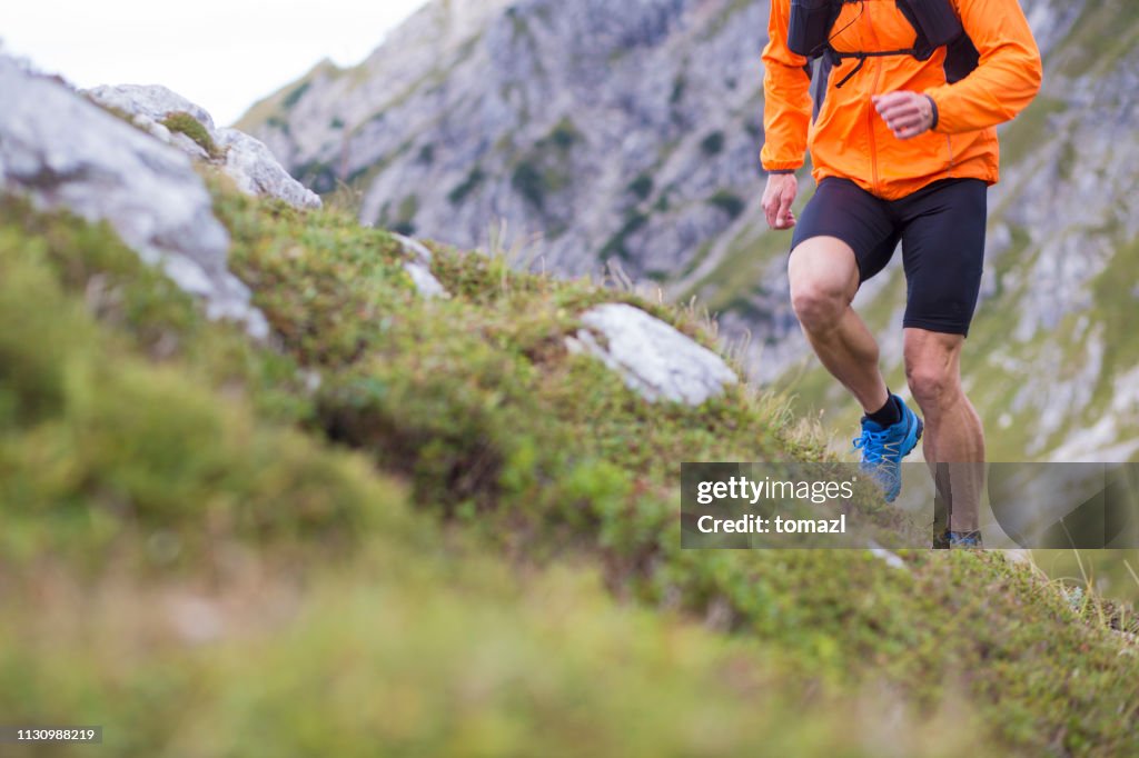 Mountain running close-up men