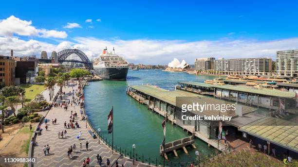 sydney opera house, the queen mary 2 and sydney harbour bridge, australia - circular quay stock pictures, royalty-free photos & images