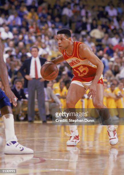 Glenn "Doc" Rivers of the Atlanta Hawks dribbles the ball during a NBA game against the Los Angeles Lakers at the Great Western Forum in Inglewood,...