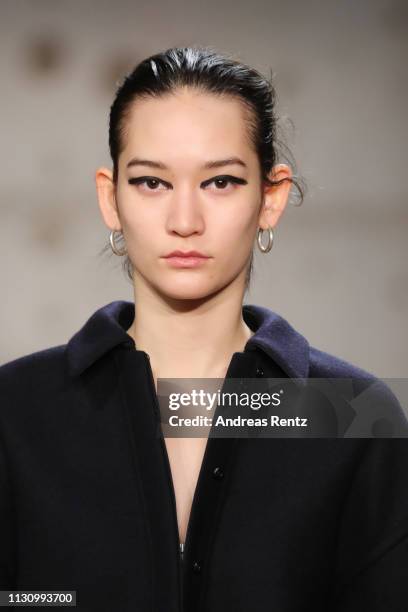 Model walks the runway at the Jil Sander show at Milan Fashion Week Autumn/Winter 2019/20 on February 20, 2019 in Milan, Italy.