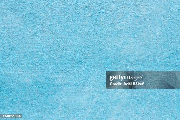 light blue plastered rusty concrete wall - paint textures ストックフォトと画像