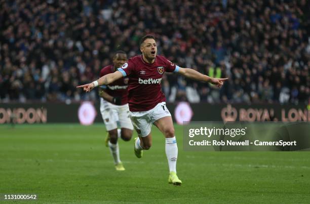 West Ham United's Javier Hernandez celebrates scoring his side's fourth goal during the Premier League match between West Ham United and Huddersfield...