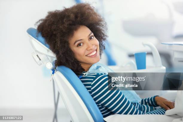 dental appointment was successful and painless. - teeth whitening stock pictures, royalty-free photos & images