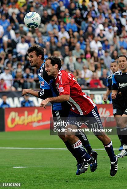 Nick LaBrocca of the Chivas USA battles for a header with Chris Wondolowski of the San Jose Earthquakes during an MLS soccer game at Buck Shaw...